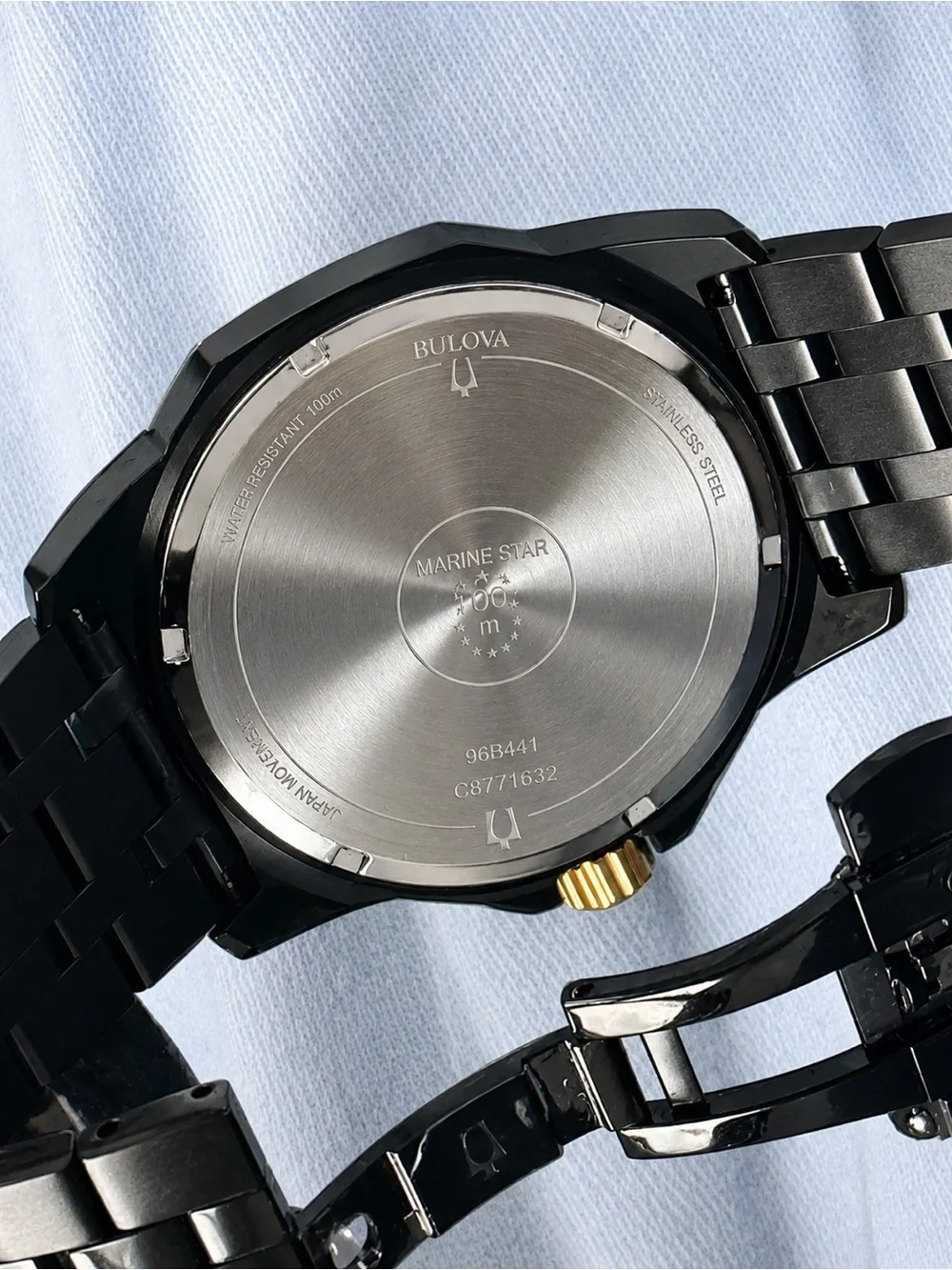 Bulova Black and Gold Ceramic Dress Watch with Crystal Accents